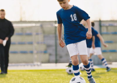 Boy playing football