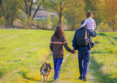 Family walking dog